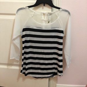 Super cute shirt that can be dressed up or down!